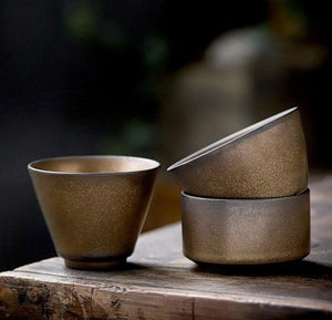 Ceramic gold glazed teacup