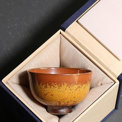 Ceramic pigmented teacup