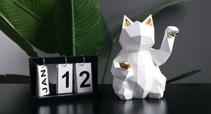 Geometric lucky cat statue
