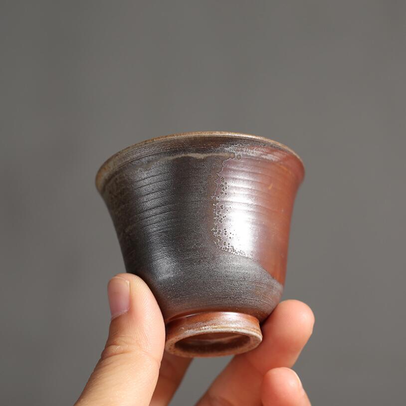 Ceramic pigmented teacup