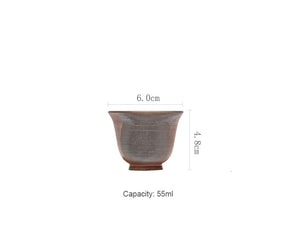 Ceramic pigmented teacup